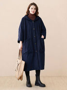 Oversized water-resistant windbreaker jacket with waterproof design and attached hood for all-season wear