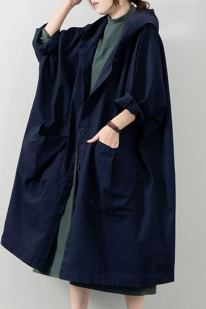 One-size oversized navy Heritage Windbreaker Jacket with hood and large pockets, lightweight and water-resistant.