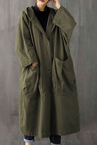 Oversized water resistant windbreaker jacket with hood and large front pockets in olive green