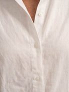 Model wearing oversized 100% cotton shirt and wide-leg pants co-ord set in relaxed style