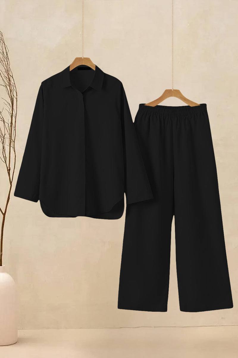 Oversized 100 cotton shirt and wide-leg pants co-ord set in black hanging on wooden hangers