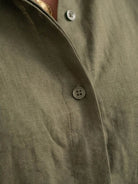 Model wearing oversized 100% cotton shirt with wide-leg pants co-ord set