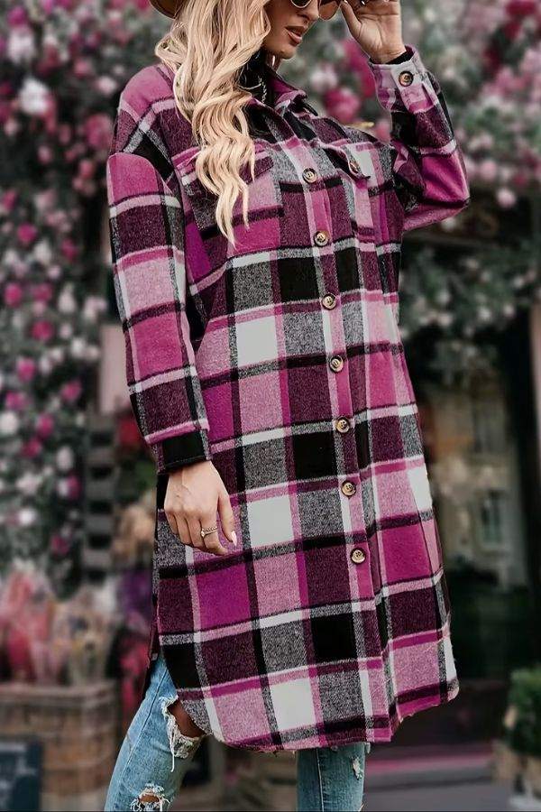 Oversized medium-length plaid overshirt in pink and black with button closure and long sleeves.