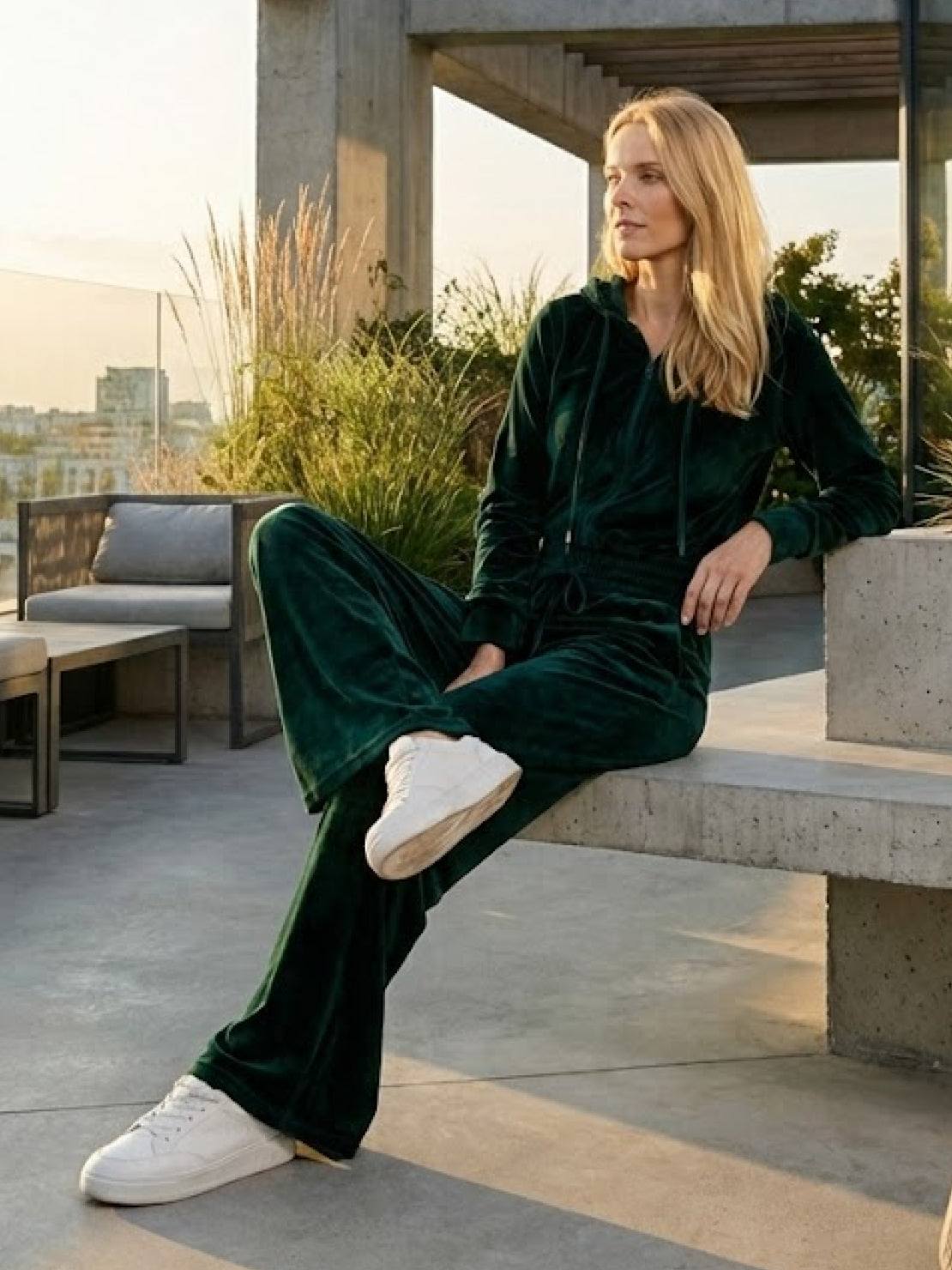 Modern velour tracksuit with cropped hoodie and high-waist pants in plush polyester fabric