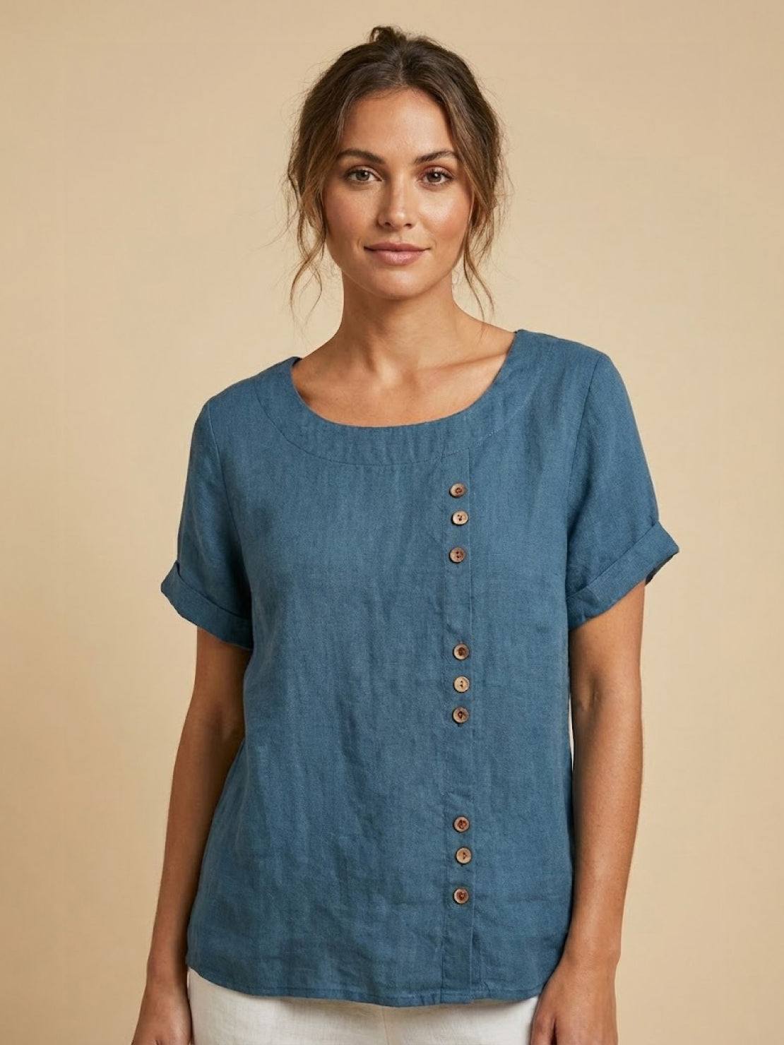 Relaxed fit linen button-up tee with breathable cotton, short sleeves, round neck, and stylish button detail for comfort and style