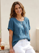 Relaxed Fit Linen Button-Up Tee with breathable cotton-linen fabric, short sleeves, round neck, and stylish button detail for casual comfort
