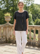 Relaxed fit linen button-up tee with breathable cotton, short sleeves, round neck, and stylish buttons for casual comfort