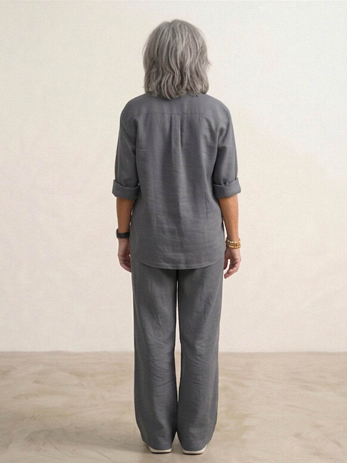 Model wearing oversized 100% cotton shirt with wide-leg pants co-ord set in relaxed fit