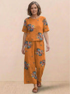 Loose fit co-ord set with soft-tailored top and wide-leg bottoms in breathable cotton blend fabric