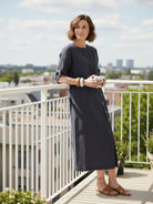 woman wearing Pure Cotton Elegance dress in soft breathable fabric perfect for travel and seasonal wear