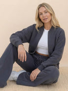 The Voyager Zip Set two-piece zip-front sweatshirt and wide-leg joggers in neutral tone for travel and casual wear