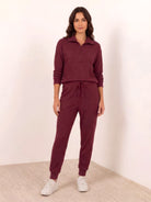 Unisex half-zip pullover and sweatpants set in relaxed fit with soft fabric for everyday comfort
