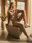 Unisex half-zip pullover and sweatpants set in soft fabric for casual and travel wear