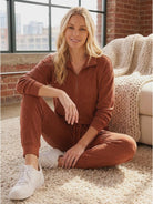Unisex half-zip pullover and sweatpants set in relaxed fit with soft fabric for everyday comfort and casual wear