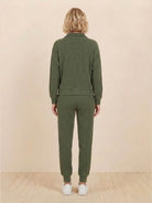 Unisex half-zip pullover and sweatpants set in relaxed fit with soft fabric for everyday comfort