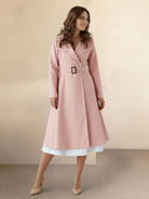 Elegant water-repellent A-line hooded raincoat for women with insulated lining and matching belt