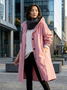 Water-Resistant Oversized Hooded Windbreaker Rain Jacket with multiple pockets and travel-friendly design